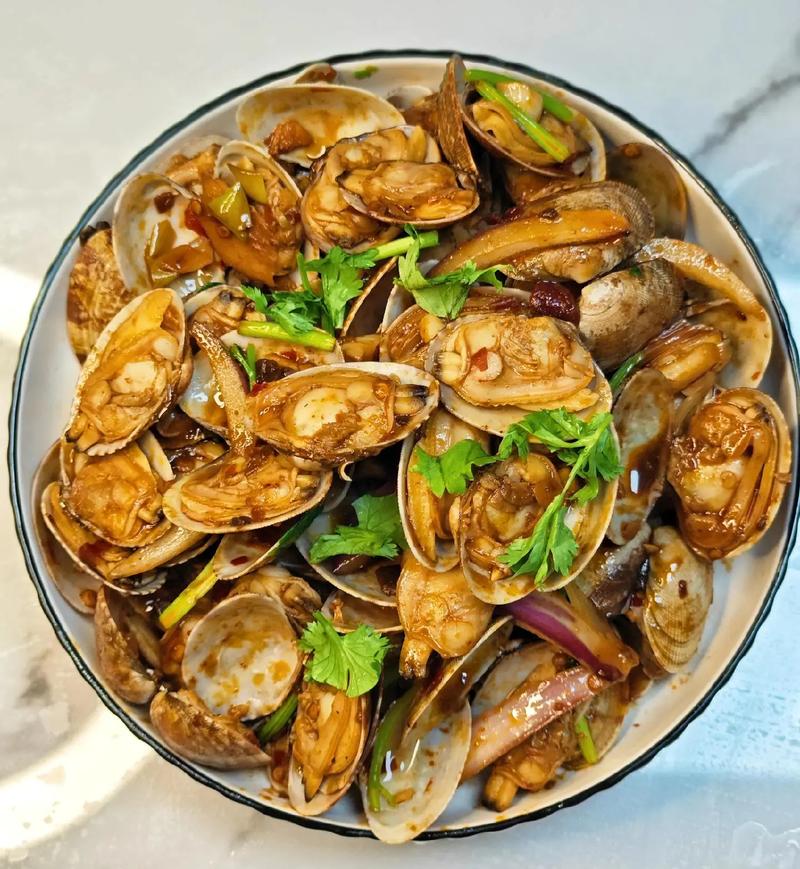 辣炒嘎啦(蛤蜊)的做法_嘎啦炒制小窍门,香辣鲜美易上手 辣炒嘎啦(蛤蜊)的做法_嘎啦炒制小窍门,香辣鲜美易上手