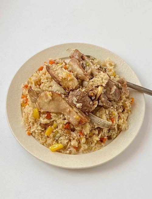 新疆手抓饭做法_历史悠久的待客佳肴