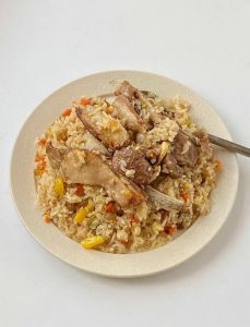 新疆手抓饭做法_历史悠久的待客佳肴