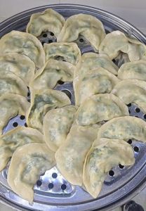 韭菜鸡蛋饺子的做法_韭菜鸡蛋饺子做法，手把手教你包出家味！